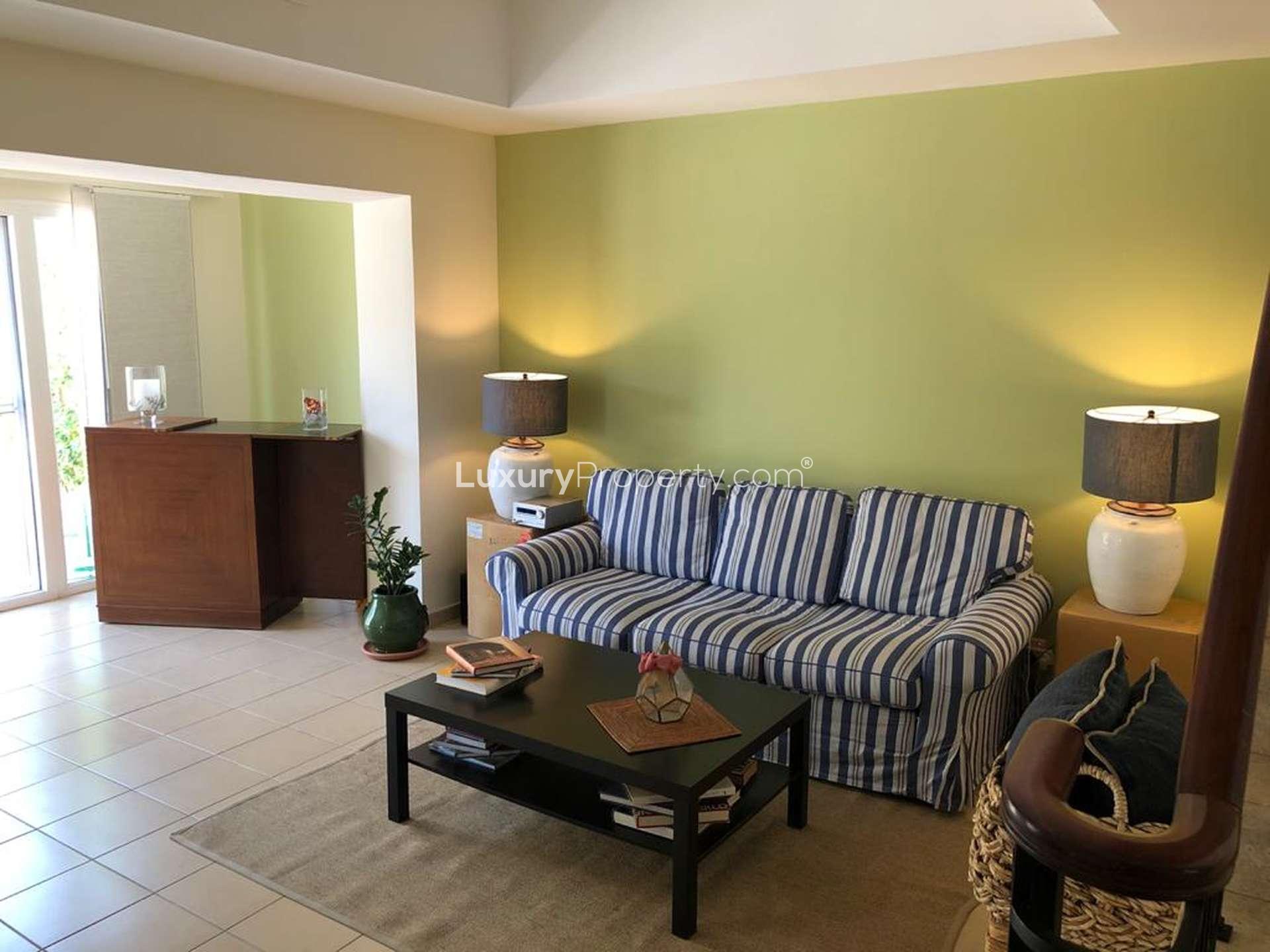 Dining area in upgraded 2-bedroom townhouse, Palmera 3, Arabian Ranches, featuring elegant decor