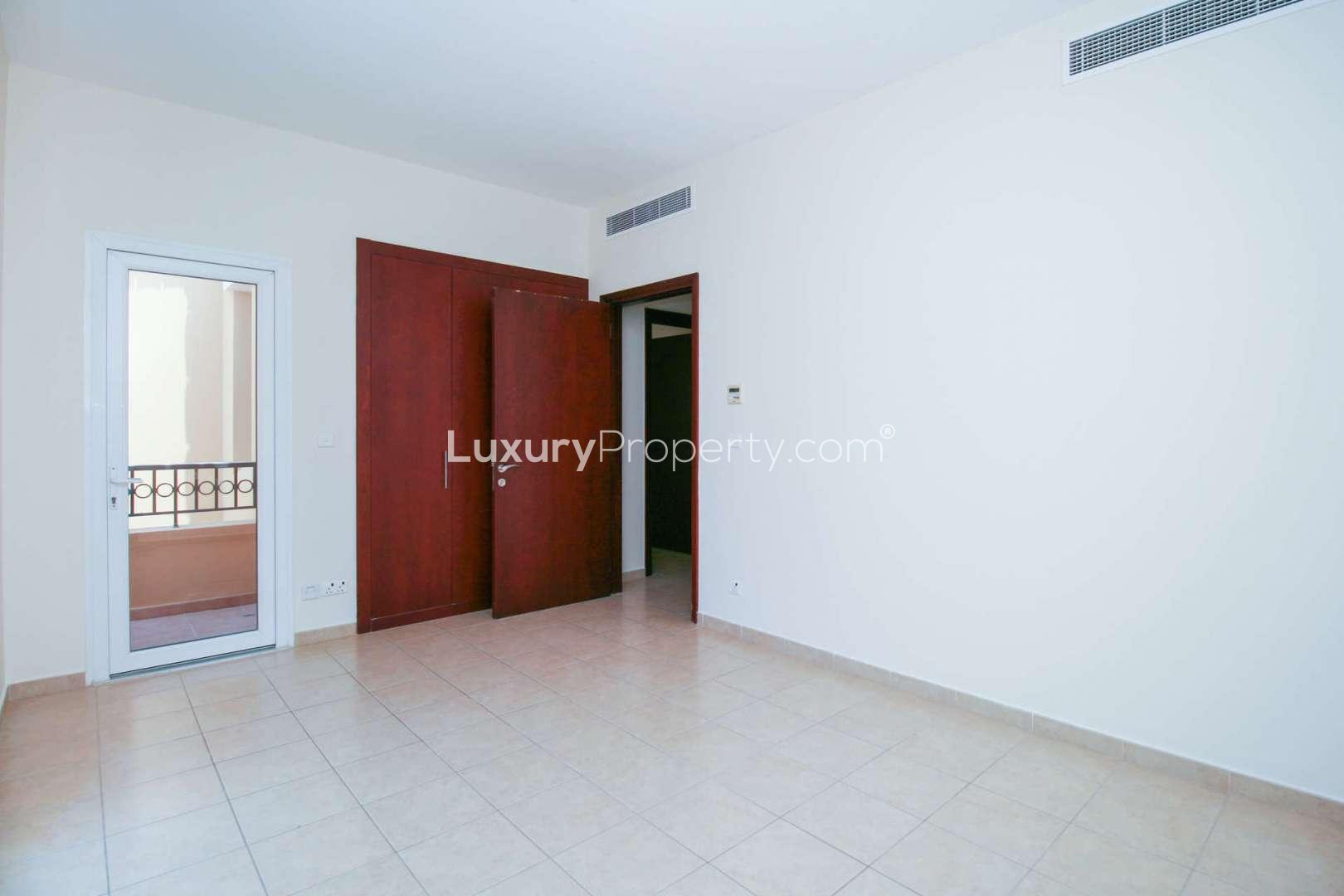 Interior view of staircase and living area in Palmera 1 villa, Arabian Ranches