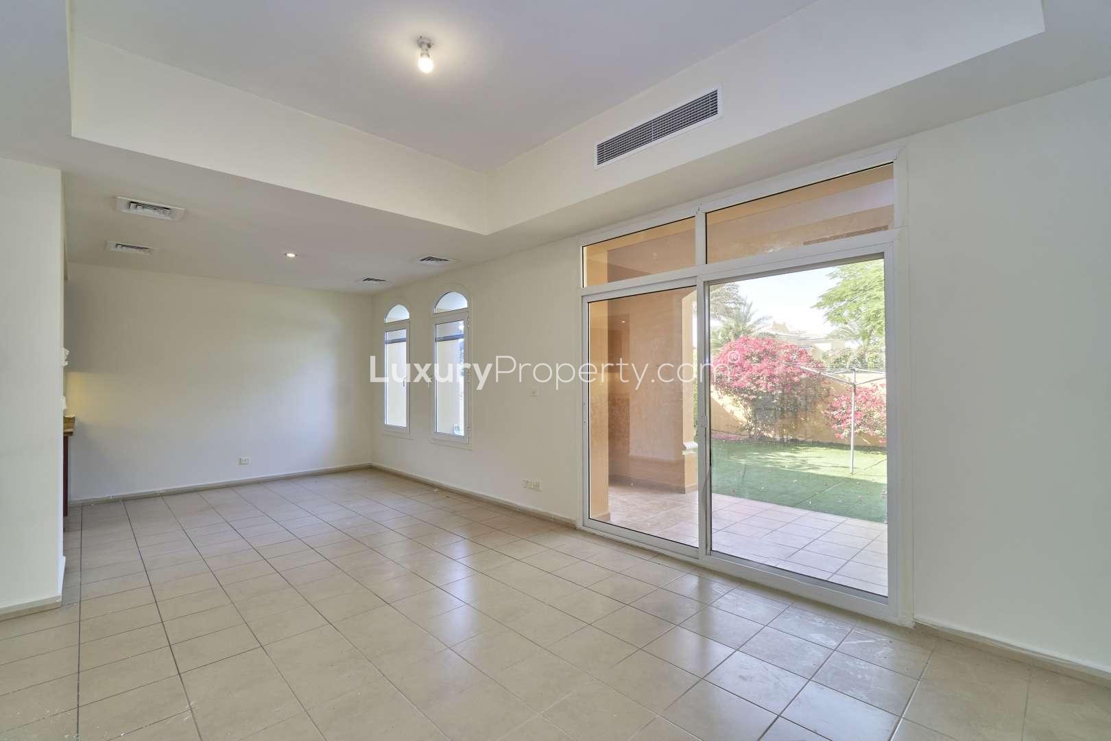 Bright living room with garden view in Palmera 2 villa, Arabian Ranches for rent