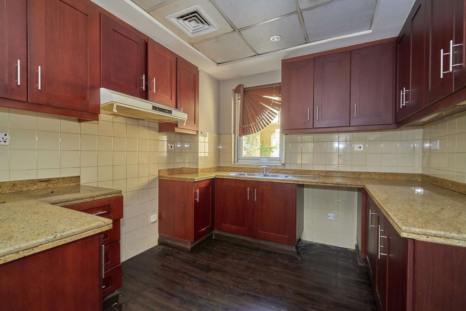 Interior of 2-bedroom villa in Palmera, Arabian Ranches with open kitchen and staircase