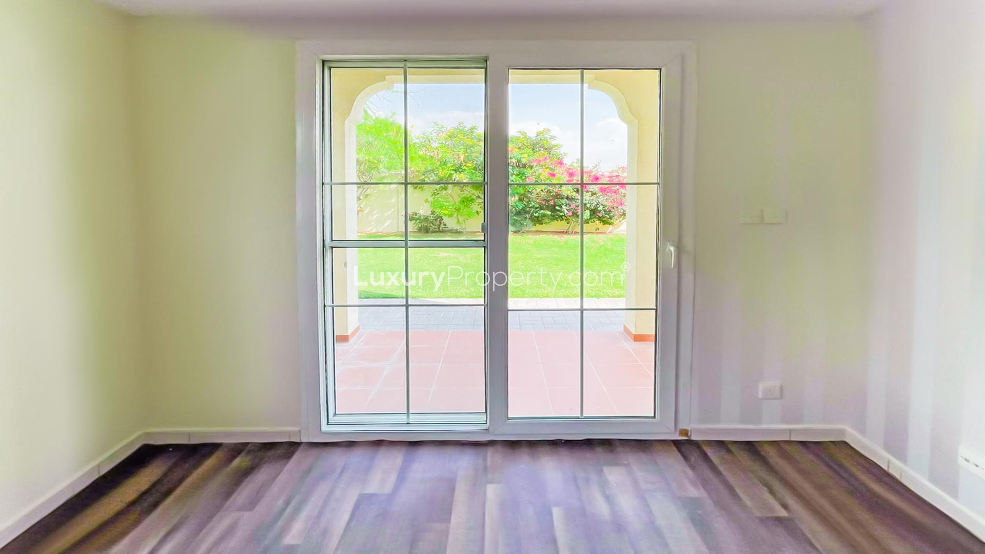 Bright living room with wooden floors in upgraded villa, The Springs, for rent