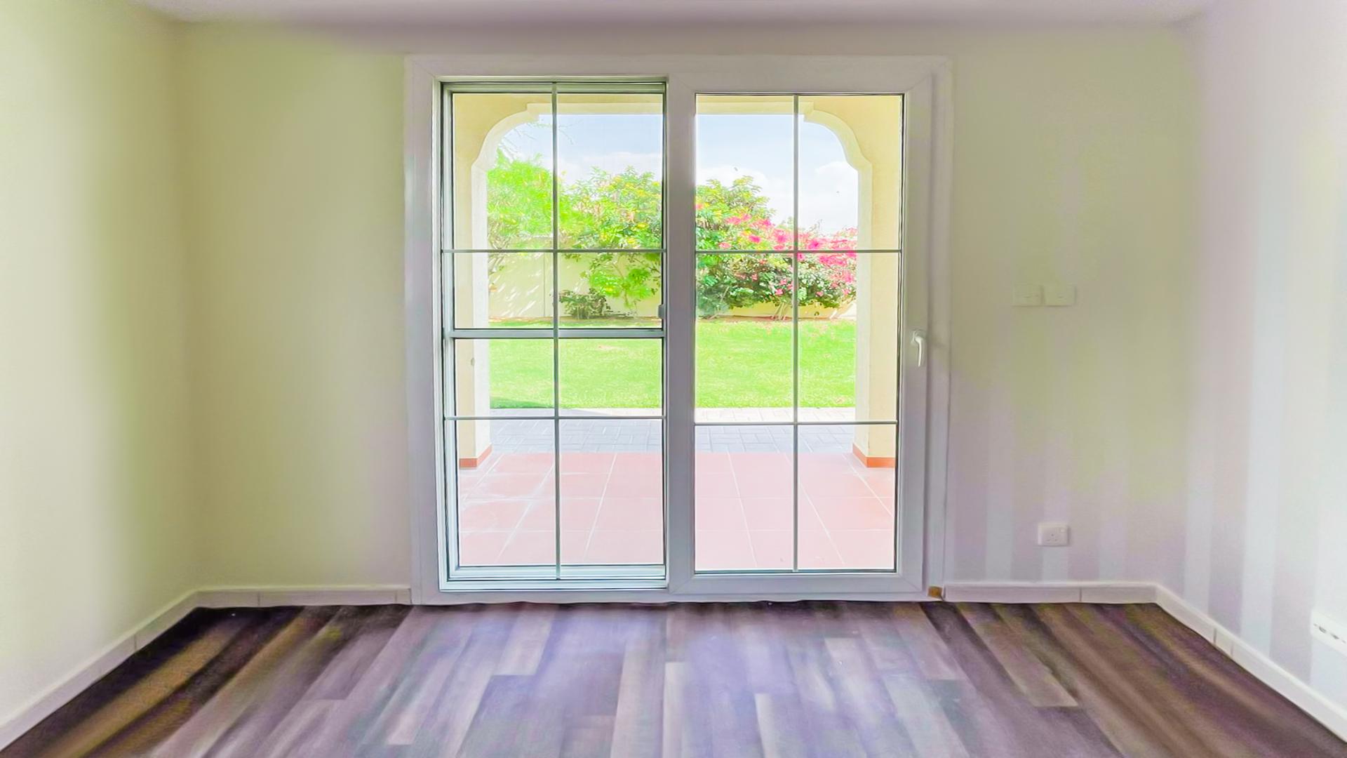 Bright living room with wooden floors in upgraded villa, The Springs, for rent