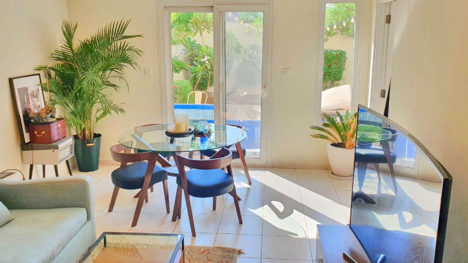 Bright living room in Springs 4 villa with modern decor and large windows