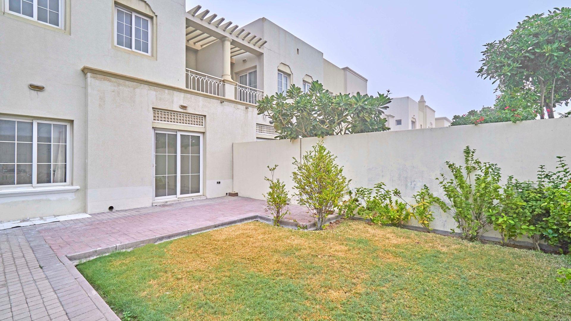 Empty living room with tiled floor and garden view in Springs 3 villa for rent