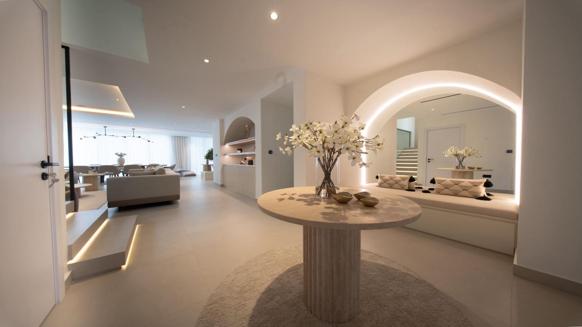 Modern living room in Jumeirah Park Villa for sale, featuring elegant interior design