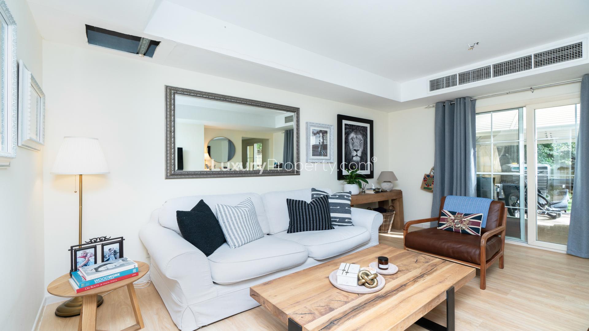 Modern kitchen in 2-bedroom villa, Springs 14, Emirates Living, with marble countertops and appliances