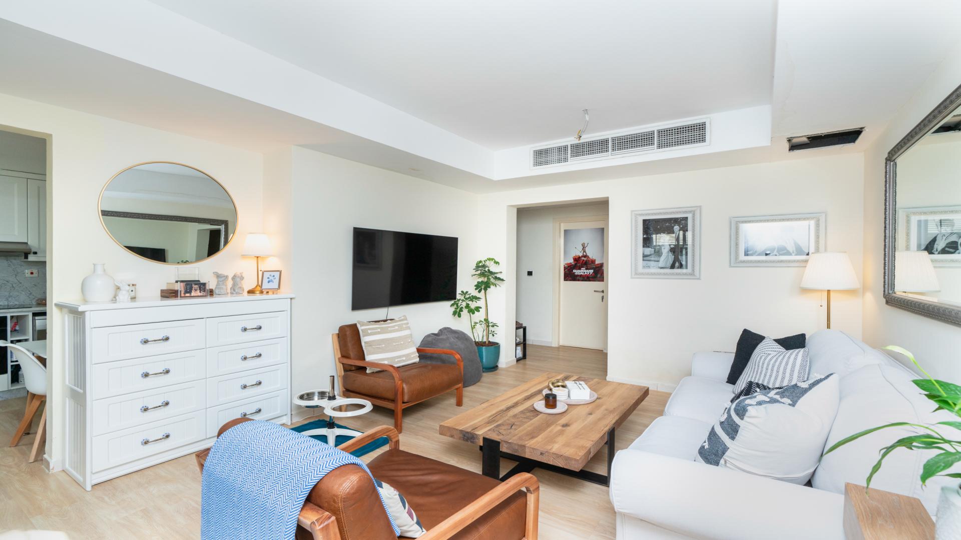 2-Bedroom Villa Backyard in Springs 14, Emirates Living with Lush Greenery and Patio