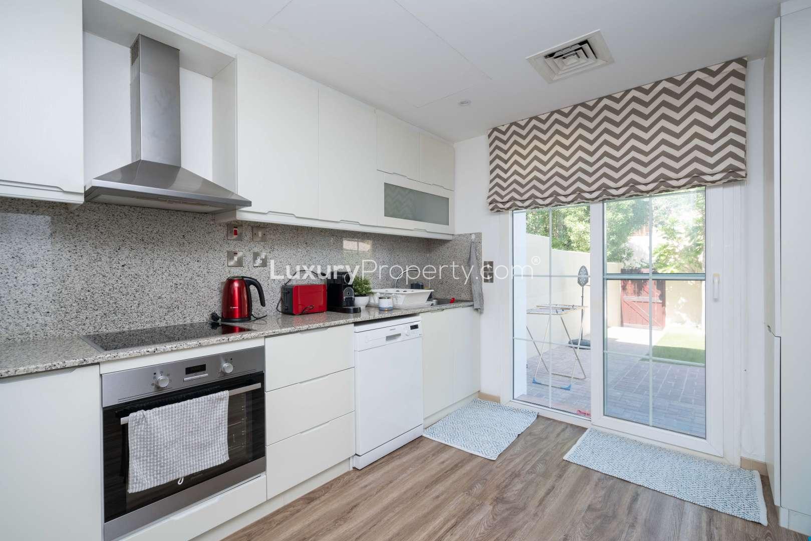 Upgraded living room in two-bedroom villa, Al Reem 2, Arabian Ranches, for sale