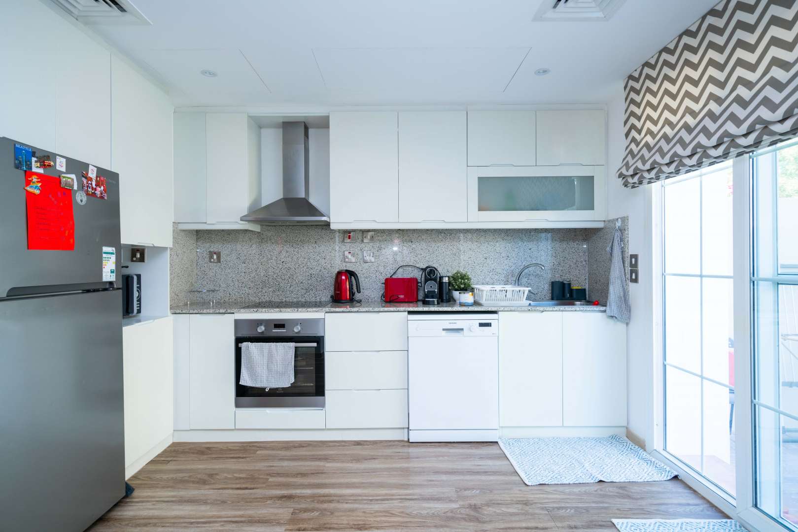 Modern kitchen in upgraded two-bedroom villa, Al Reem 2, Arabian Ranches for sale