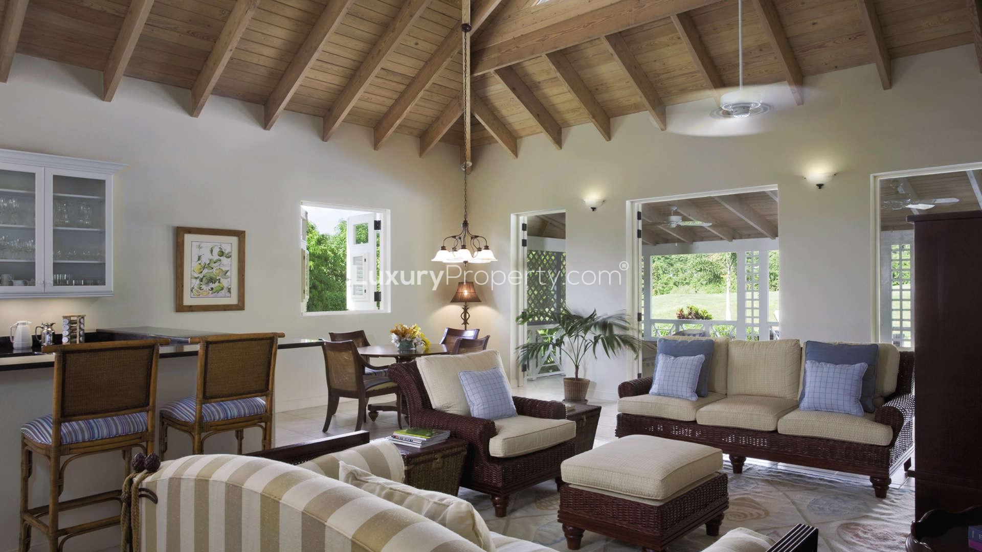 Two-bedroom villa exterior at Palm Grove Villas, Nevis Estate, lush garden view