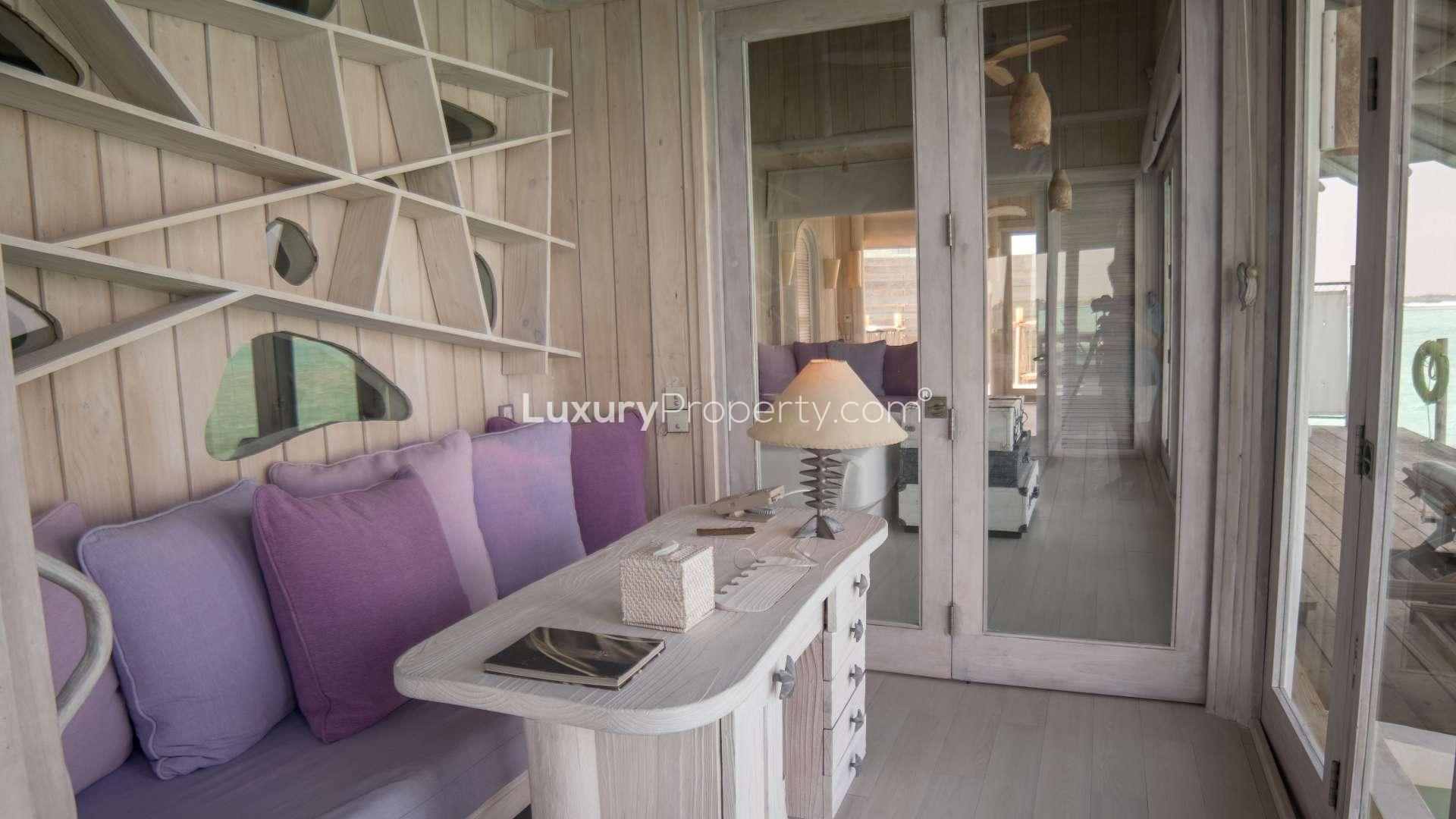 Cozy living area in two-bed water retreat villa, Soneva Jani, Noonu Atoll
