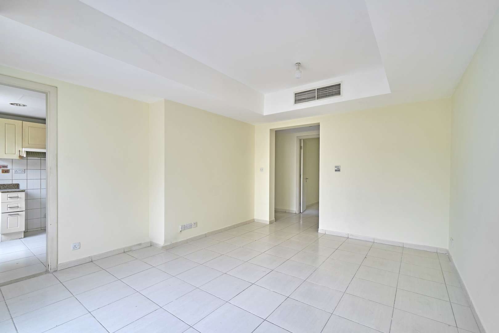 Vacant living room in 2-bedroom villa, Springs 14, Emirates Living, for sale