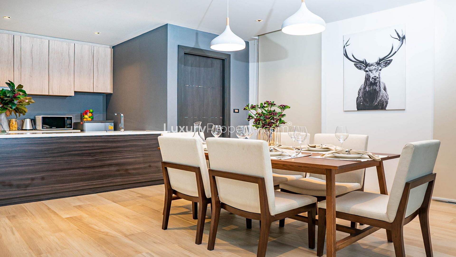 Dining area in Thalang villa, Phuket with modern decor and elegant furnishings