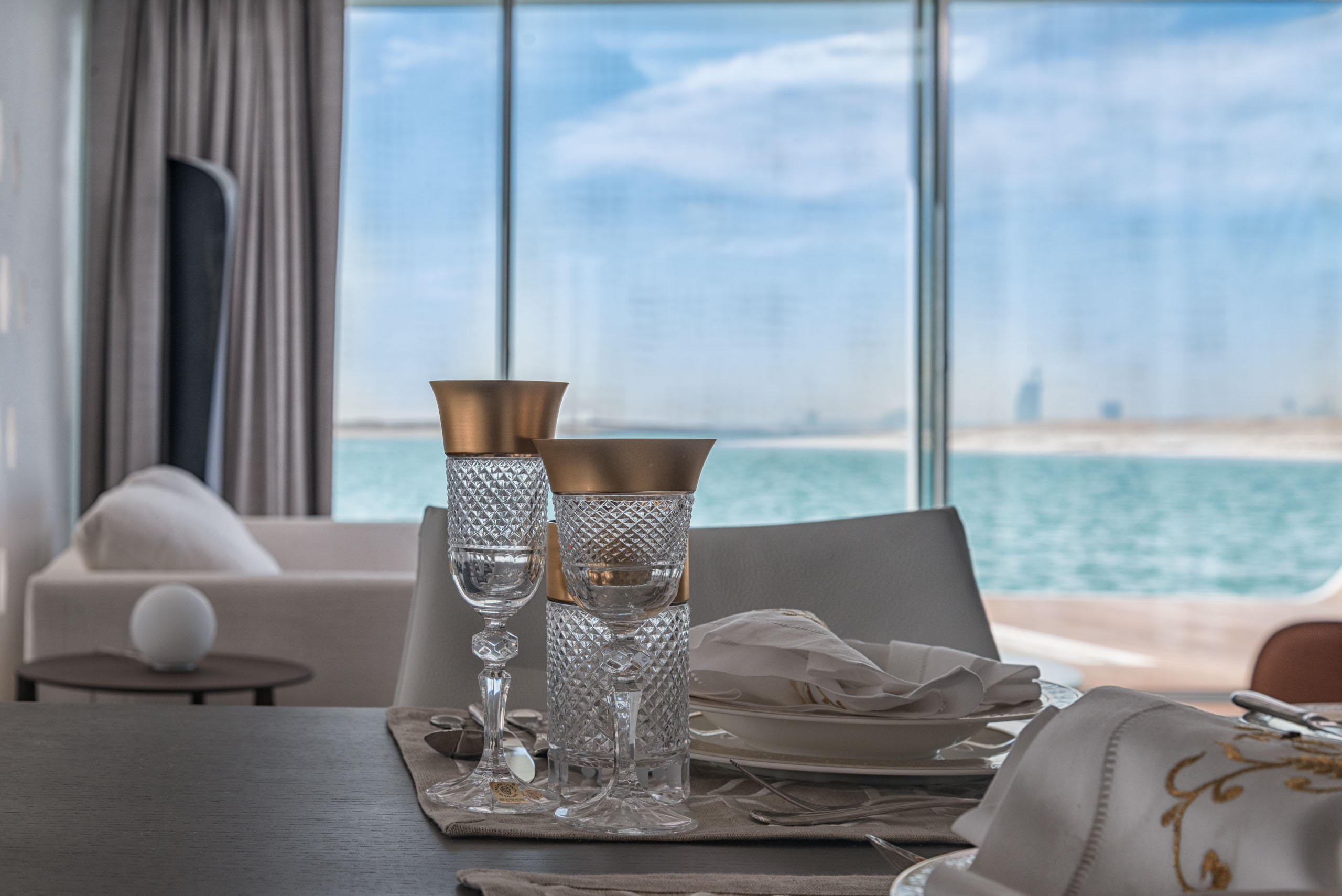 Luxury dining setup with sea view at The Floating Seahorse Villa, Dubai