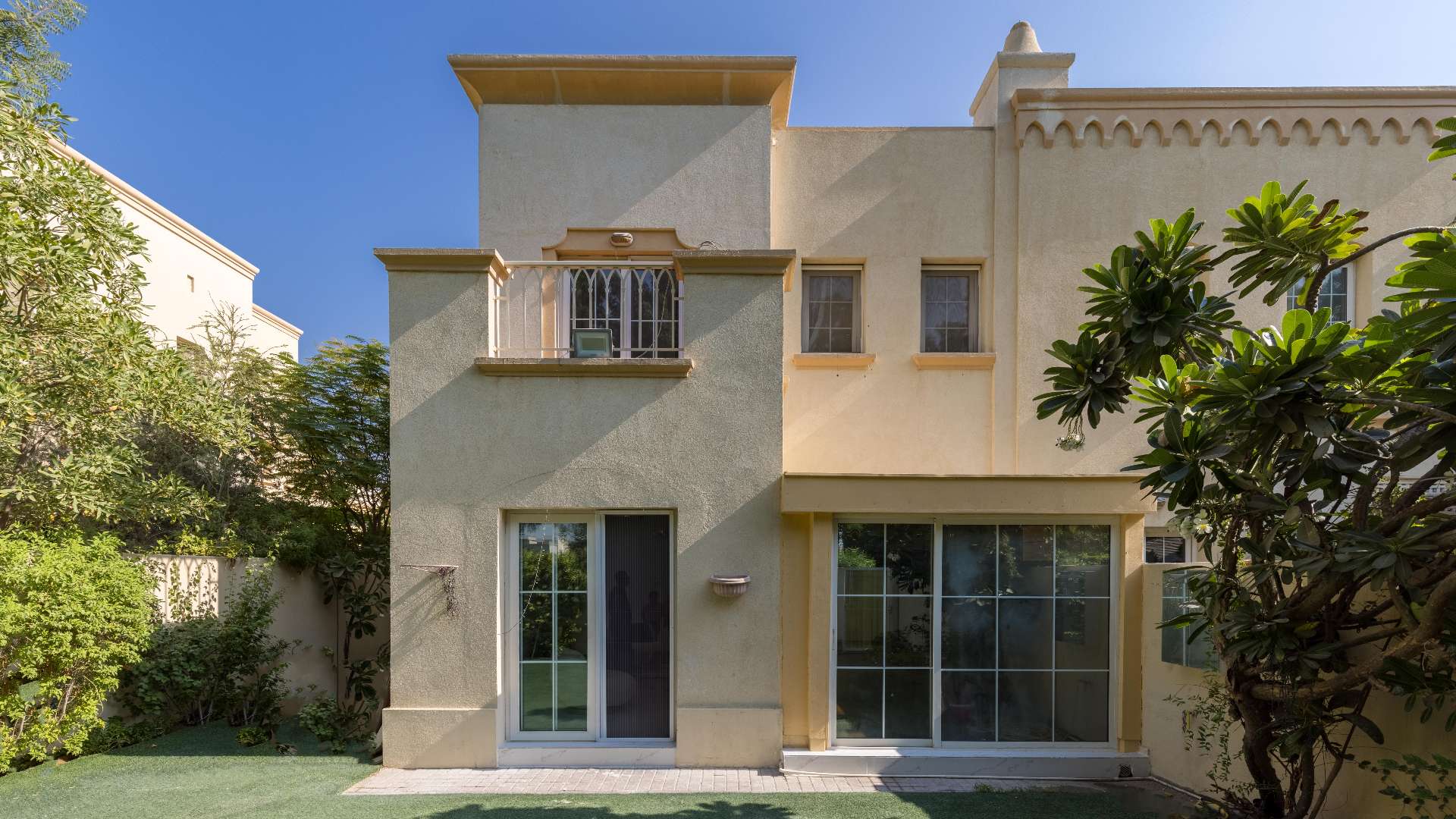 Living room in upgraded 2-bedroom villa, Springs 12, featuring modern decor and garden view