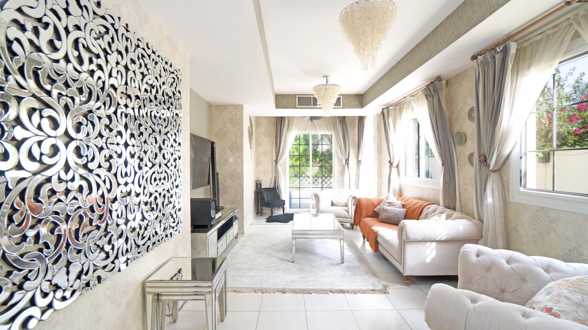 Elegant living room in 2-bedroom villa, Springs 8, with chic decor and natural light