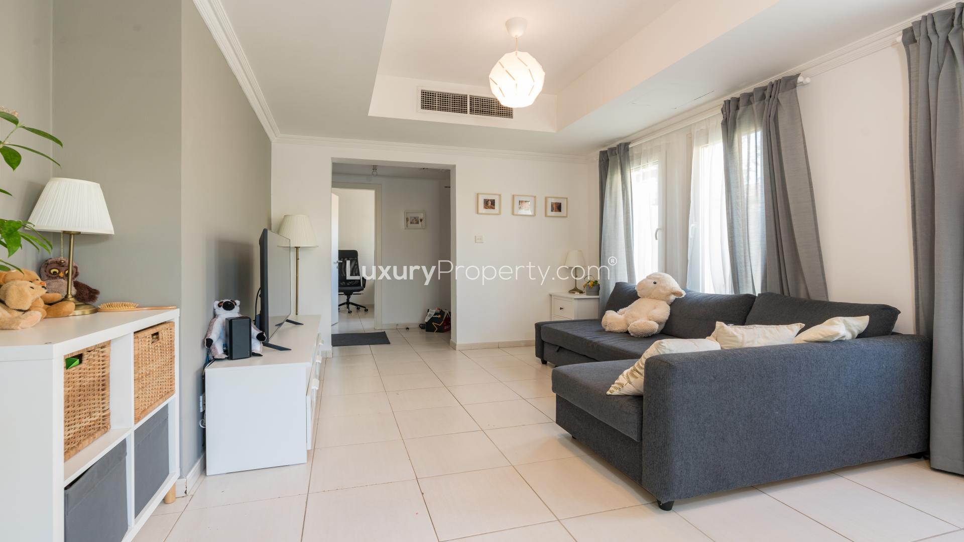 Living room in Springs 4 villa with large windows and garden view, LP16121