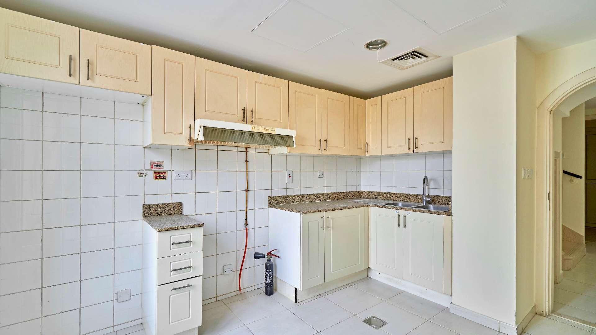 Empty villa room with garden view in Springs 14, 2-bedroom property for sale