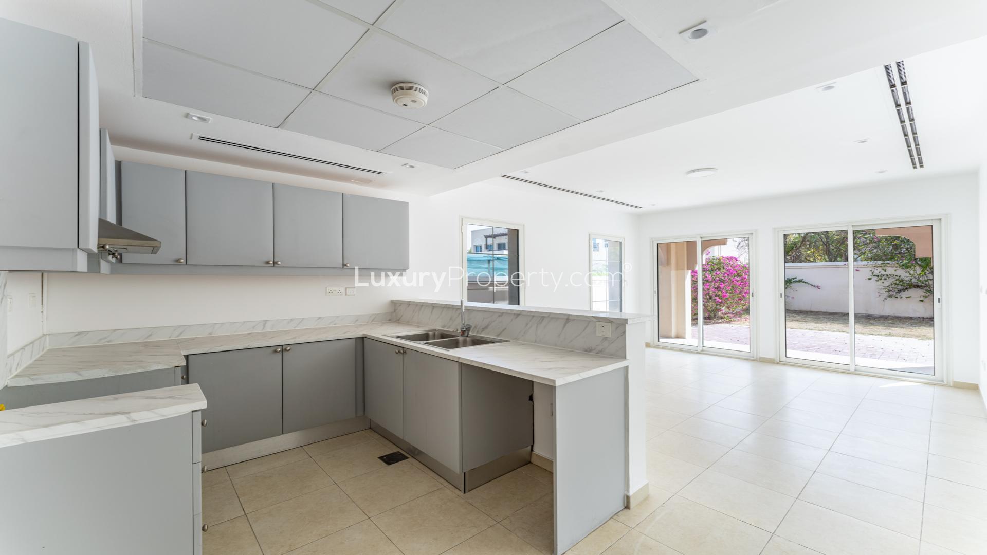 Modern kitchen in JVT villa, spacious layout with garden view, District 3C, for sale