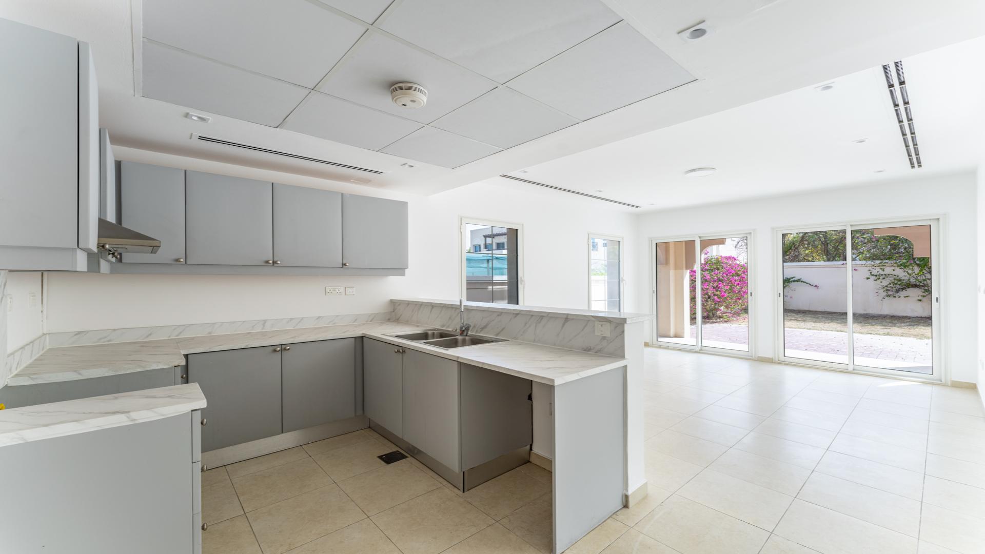 Modern kitchen in JVT villa, spacious layout with garden view, District 3C, for sale