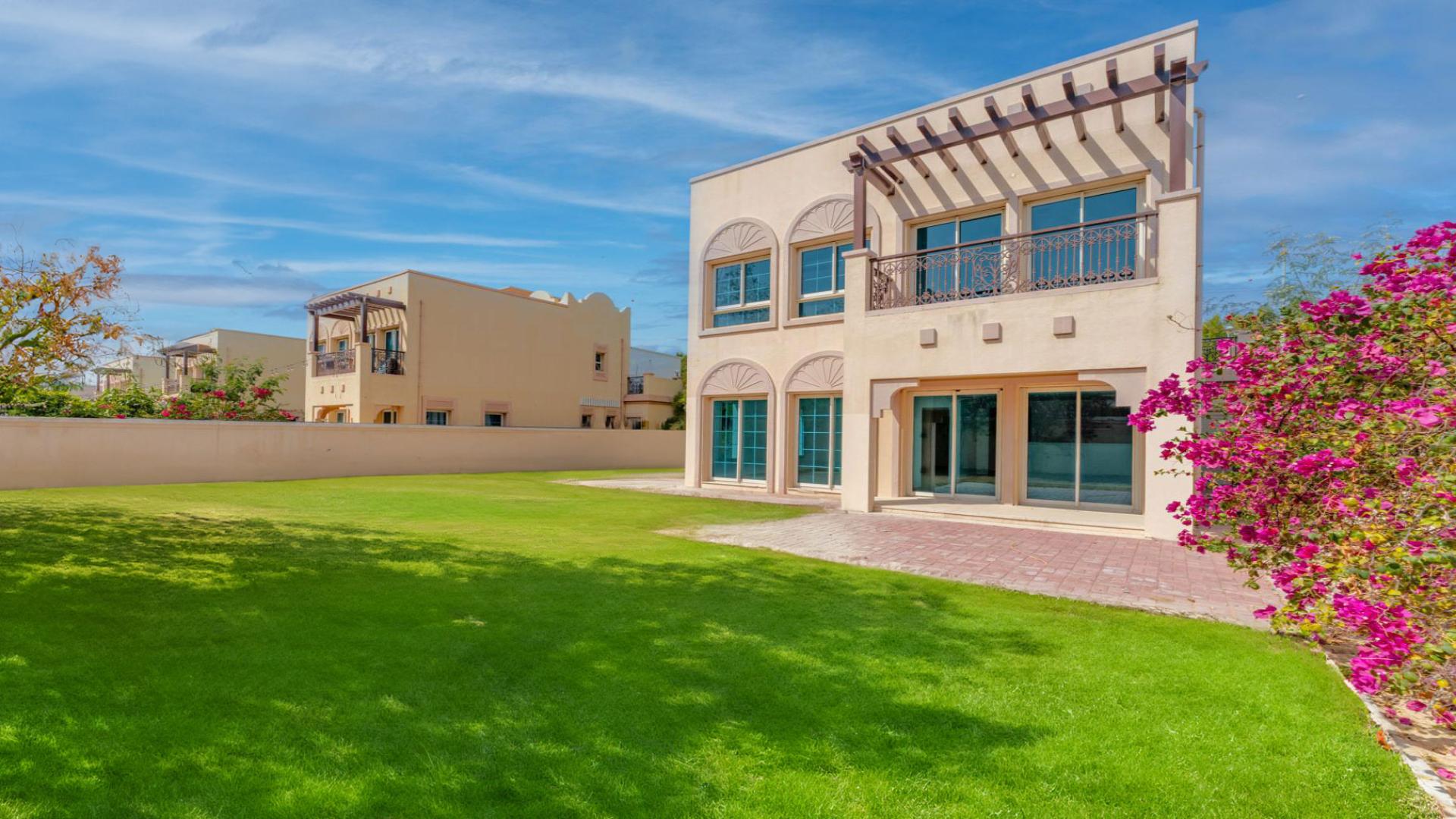 "Spacious JVT villa with lush garden for sale in District 3C, 2-bedroom, 3-bathroom.","Bright interior of JVT villa for sale, featuring modern design and spacious layout.",Bright open-plan kitchen and living area in JVT villa, District 3C, for sale