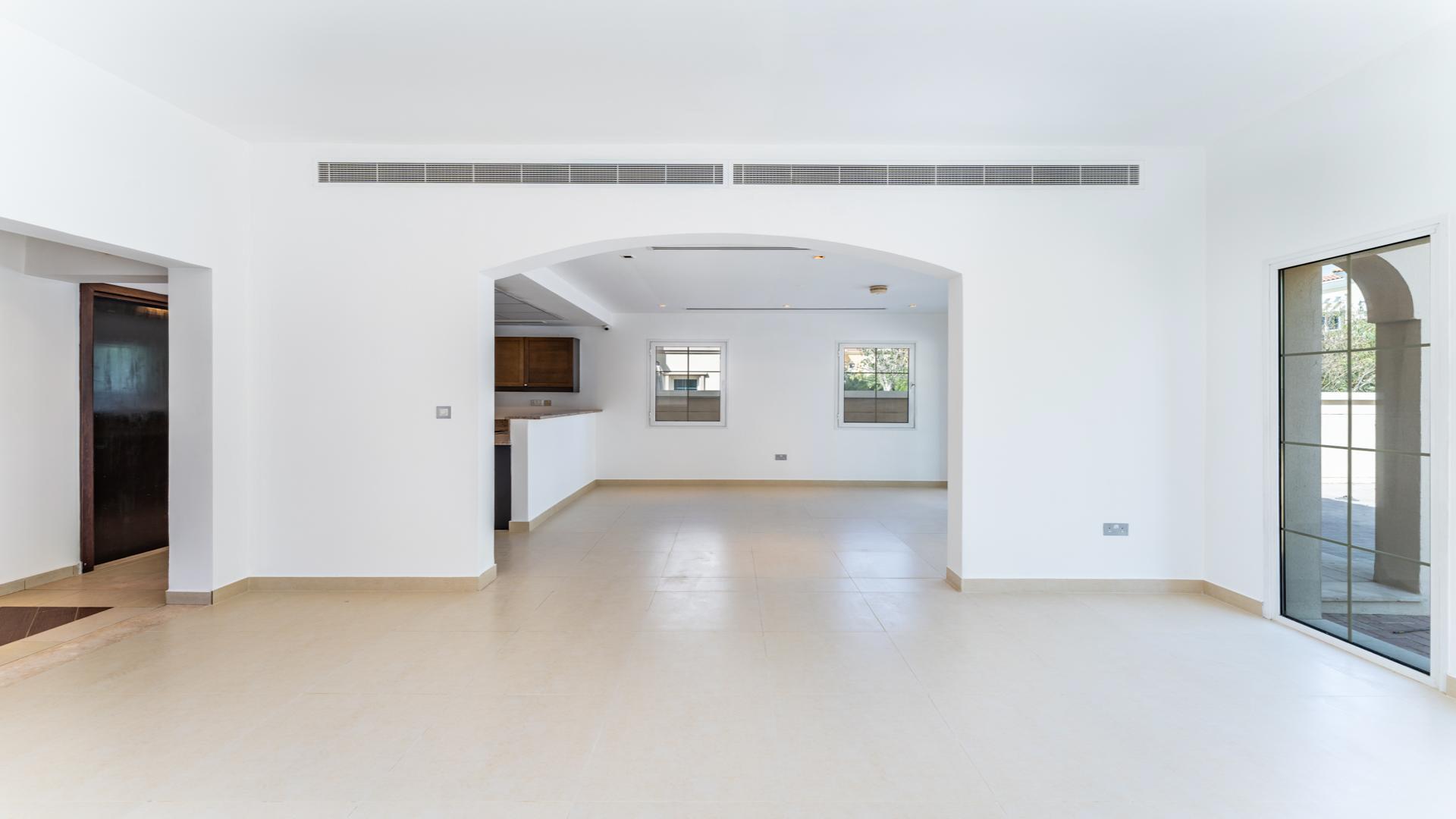 Spacious living area in stylish two-bedroom villa, Jumeirah Village Triangle District 9G