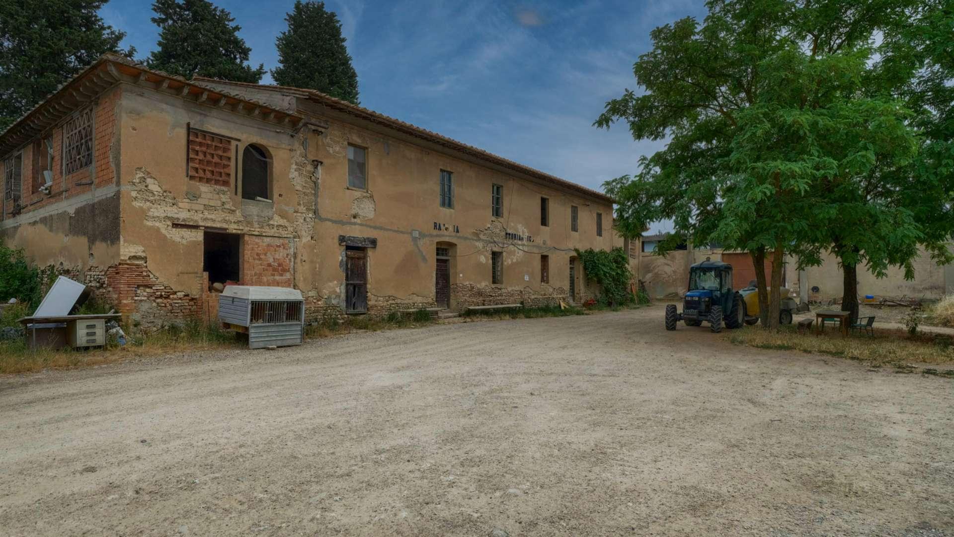 Tuscan estate exterior with historic buildings, trees, and parked cars in Florence, Borgo Rosa Antico