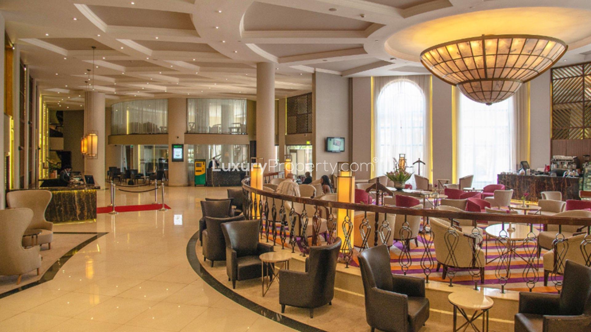 Luxury hotel bar and lounge with elegant spiral staircase in Nairobi's Upper Hill