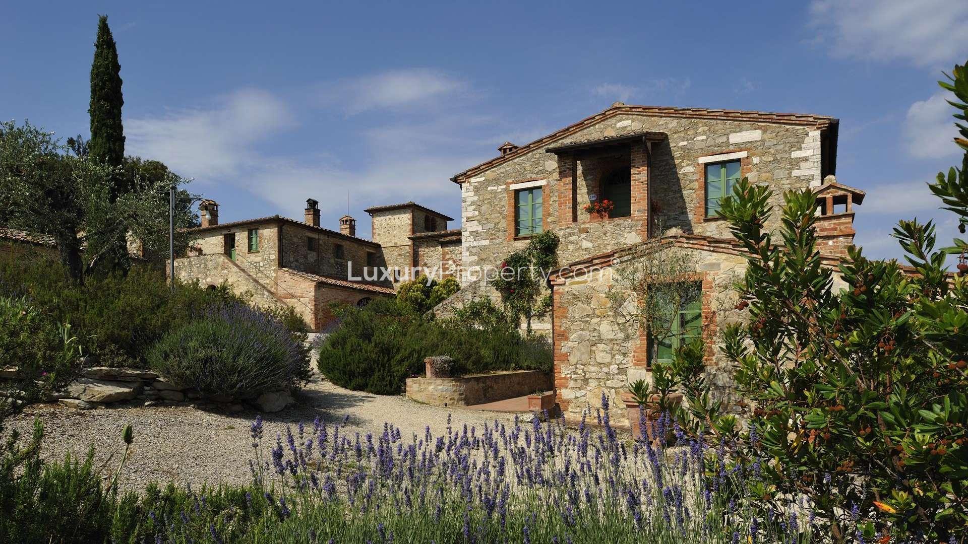 Villa Estate in Siena's Borgo Bio, charming stone architecture, scenic pathway, for sale