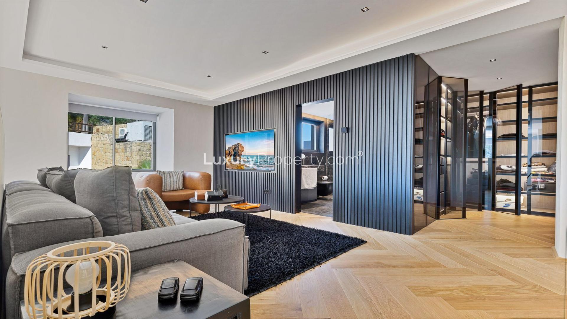 Modern home office in luxury Benahavís villa, featuring sleek decor and large window view