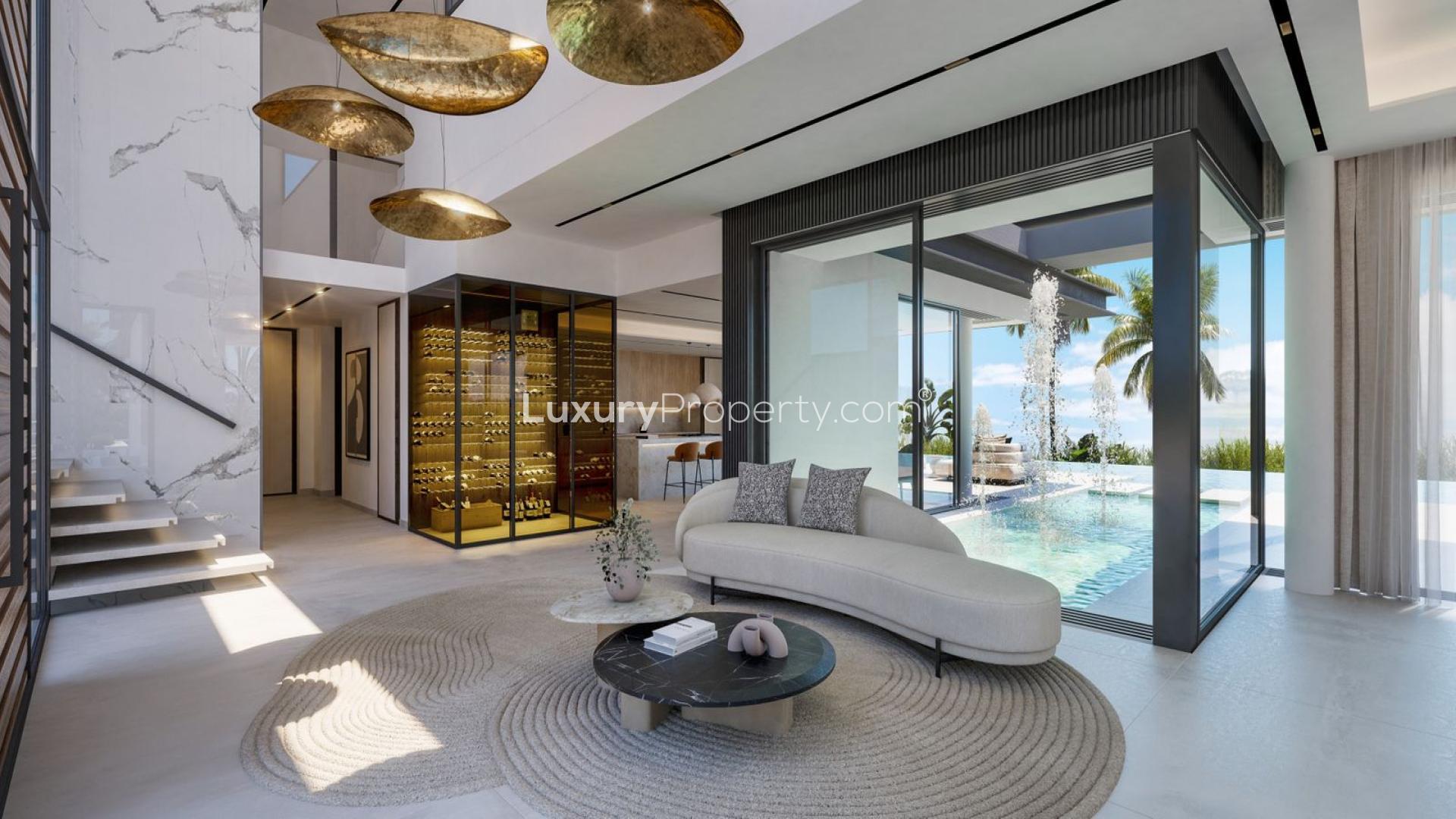 Luxury living room in 7-bedroom villa, El Paraíso, Benahavis, with modern decor and garden views