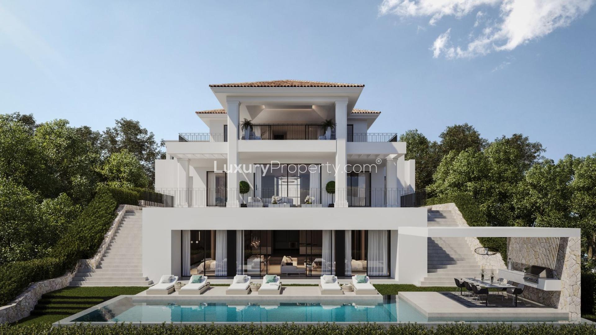 Luxurious dining room with elegant chandelier in Benahavís villa, overlooking scenic views