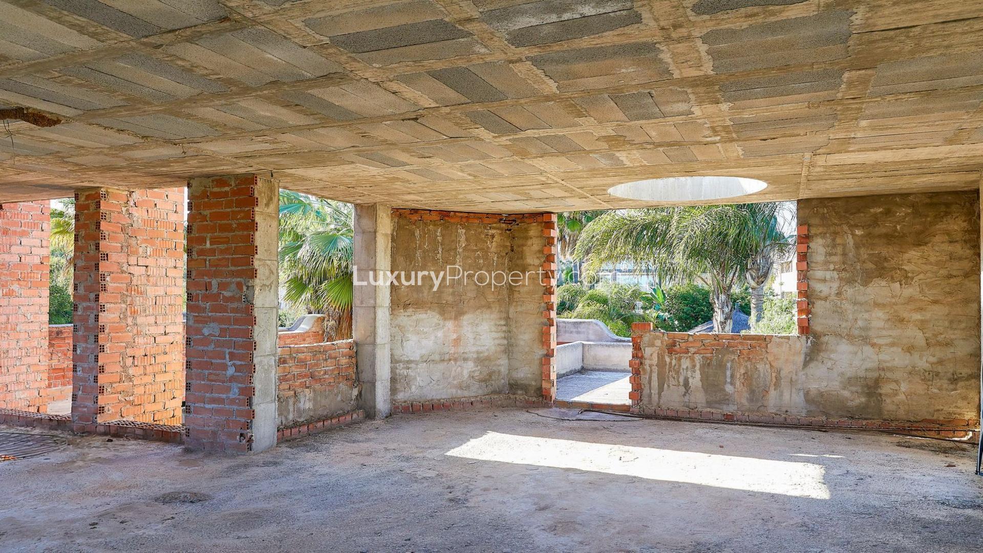 Alt text: "Unfinished brick villa construction in Atalaya de Río Verde, Marbella, for sale.",Unfinished interior of villa for sale in Atalaya de Río Verde, Marbella