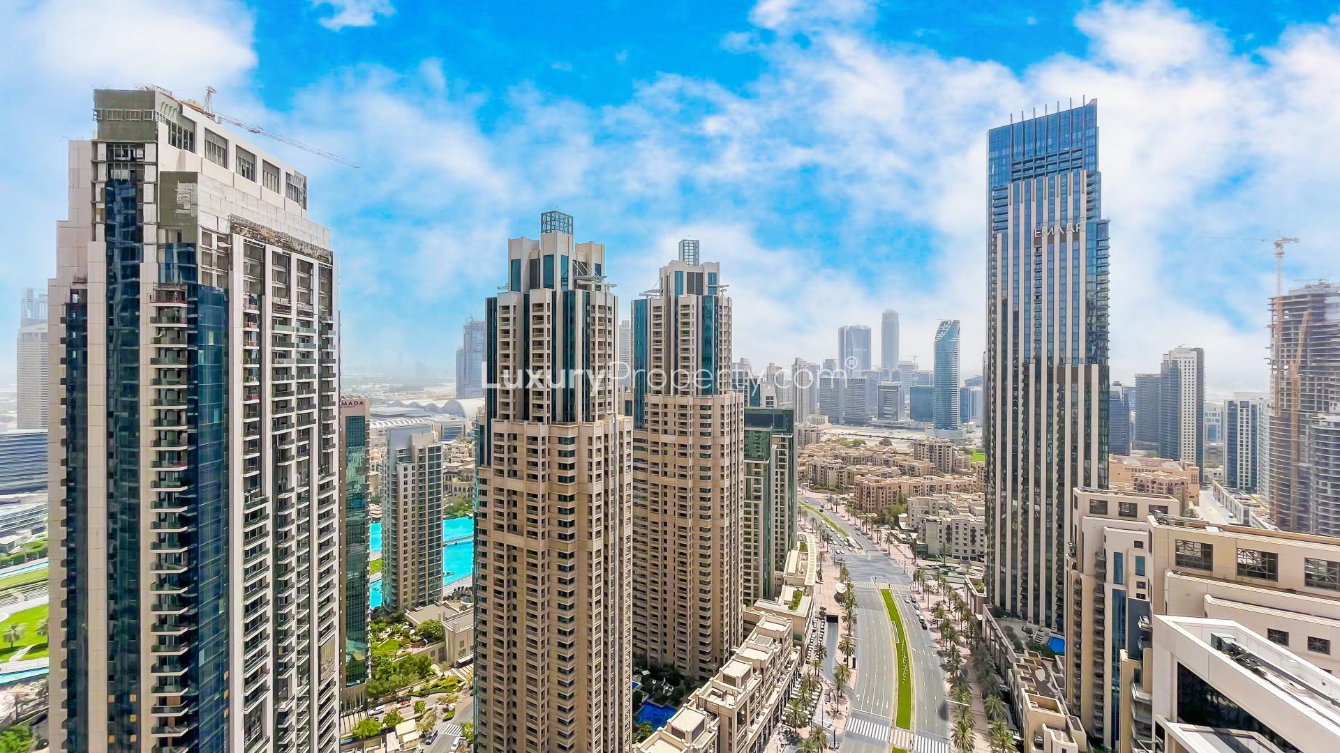 Spacious living room in BLVD Crescent apartment with large windows, Downtown Dubai view
