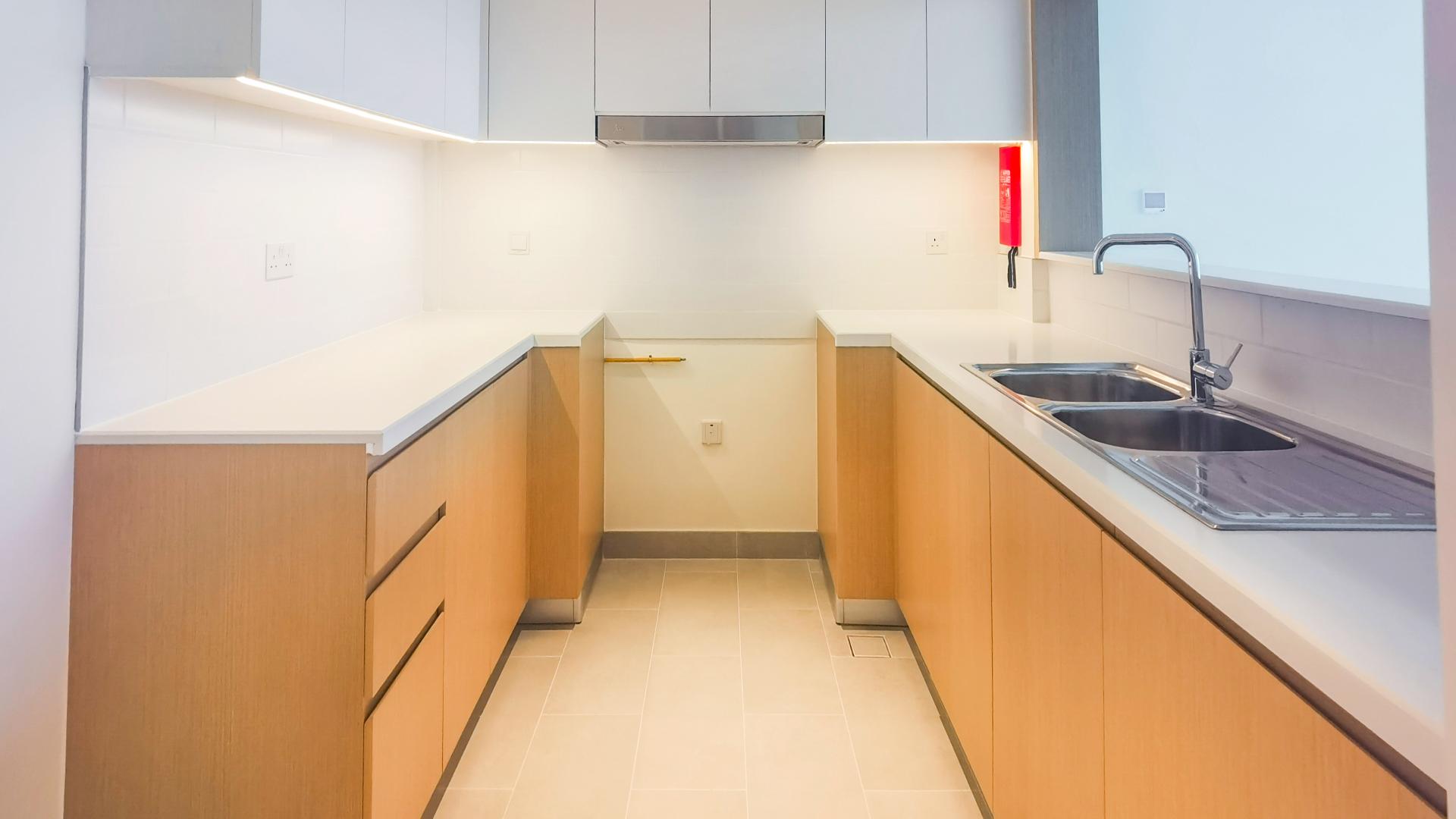 Modern kitchen with sleek cabinetry in Creek Rise apartment, Dubai Creek Harbour