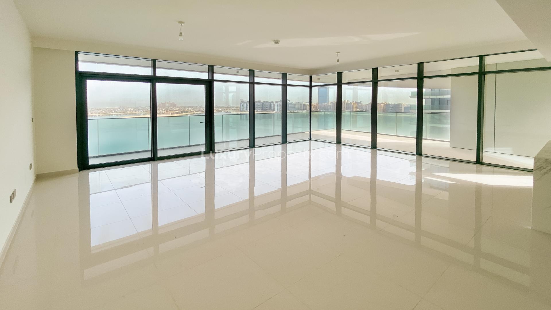 Stunning Dubai Harbour apartment with panoramic sea view from living room at Emaar Beachfront