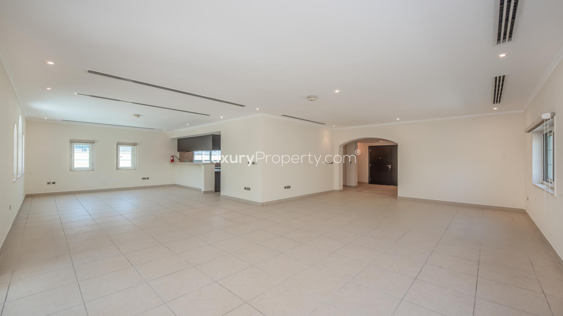 Spacious living area with staircase in Jumeirah Park Legacy villa for rent, 3 bedrooms