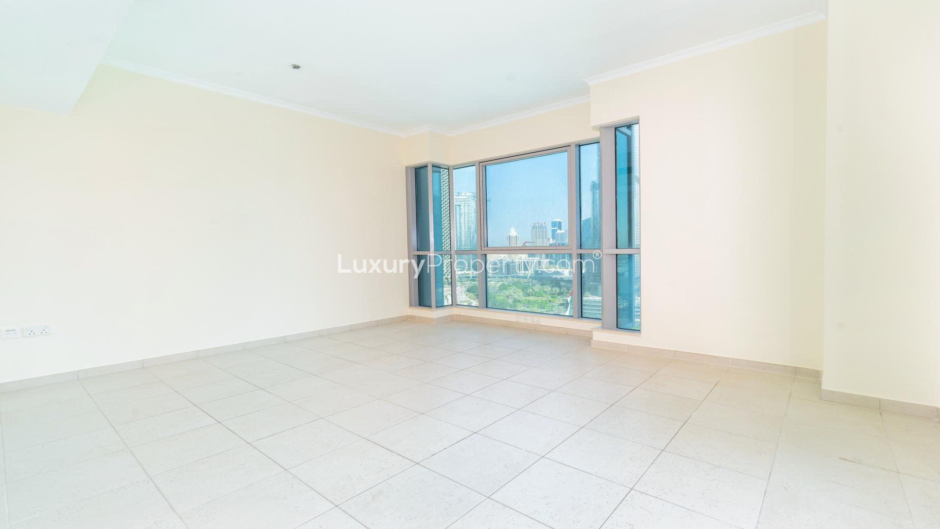 Empty apartment interior with Burj Khalifa and Fountain views in Downtown Dubai, The Residences