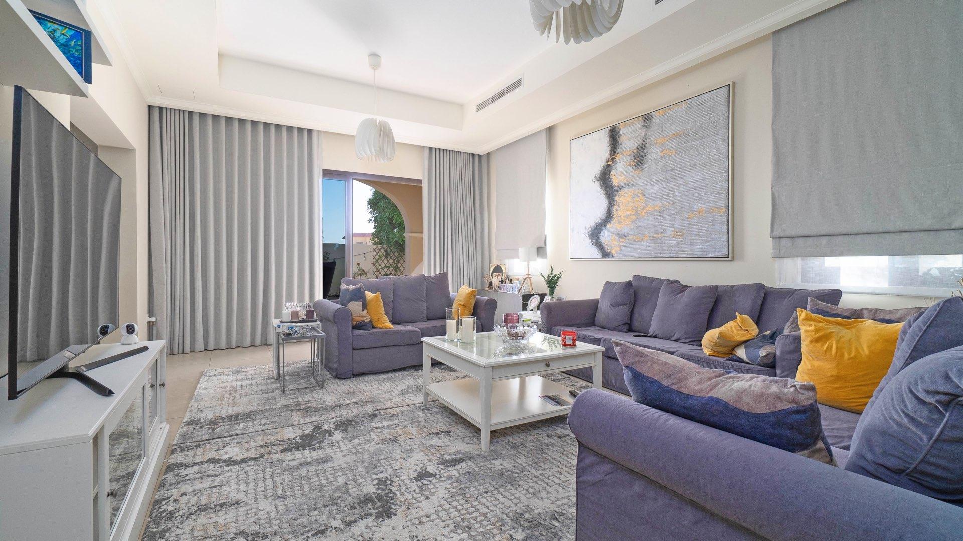 "Single row standalone villa with garden in Lila, Arabian Ranches 2, for sale.",Bright living room with modern decor in Lila villa, Arabian Ranches 2