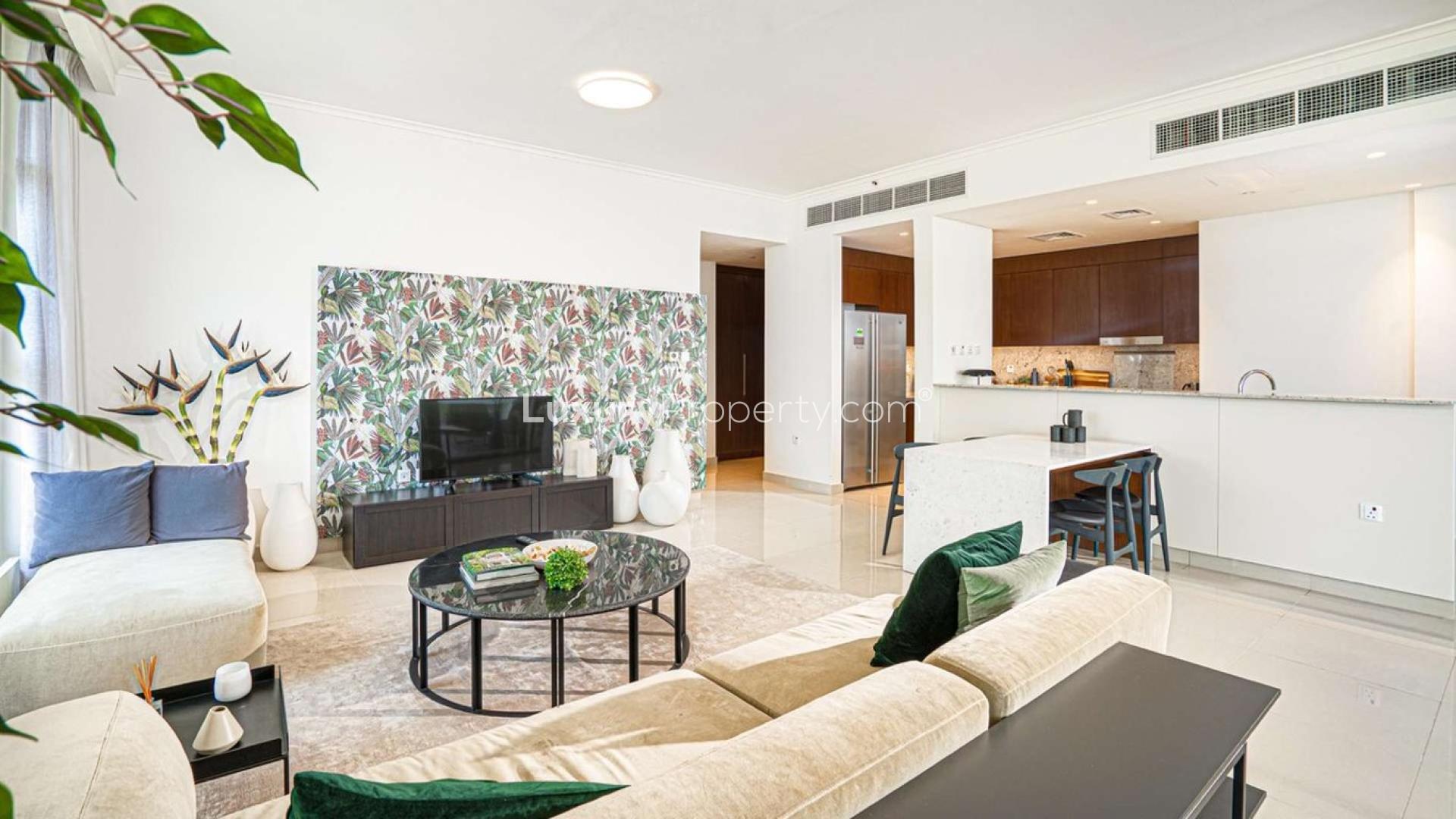 Modern open-plan kitchen and living area in Dubai Hills Estate apartment for rent