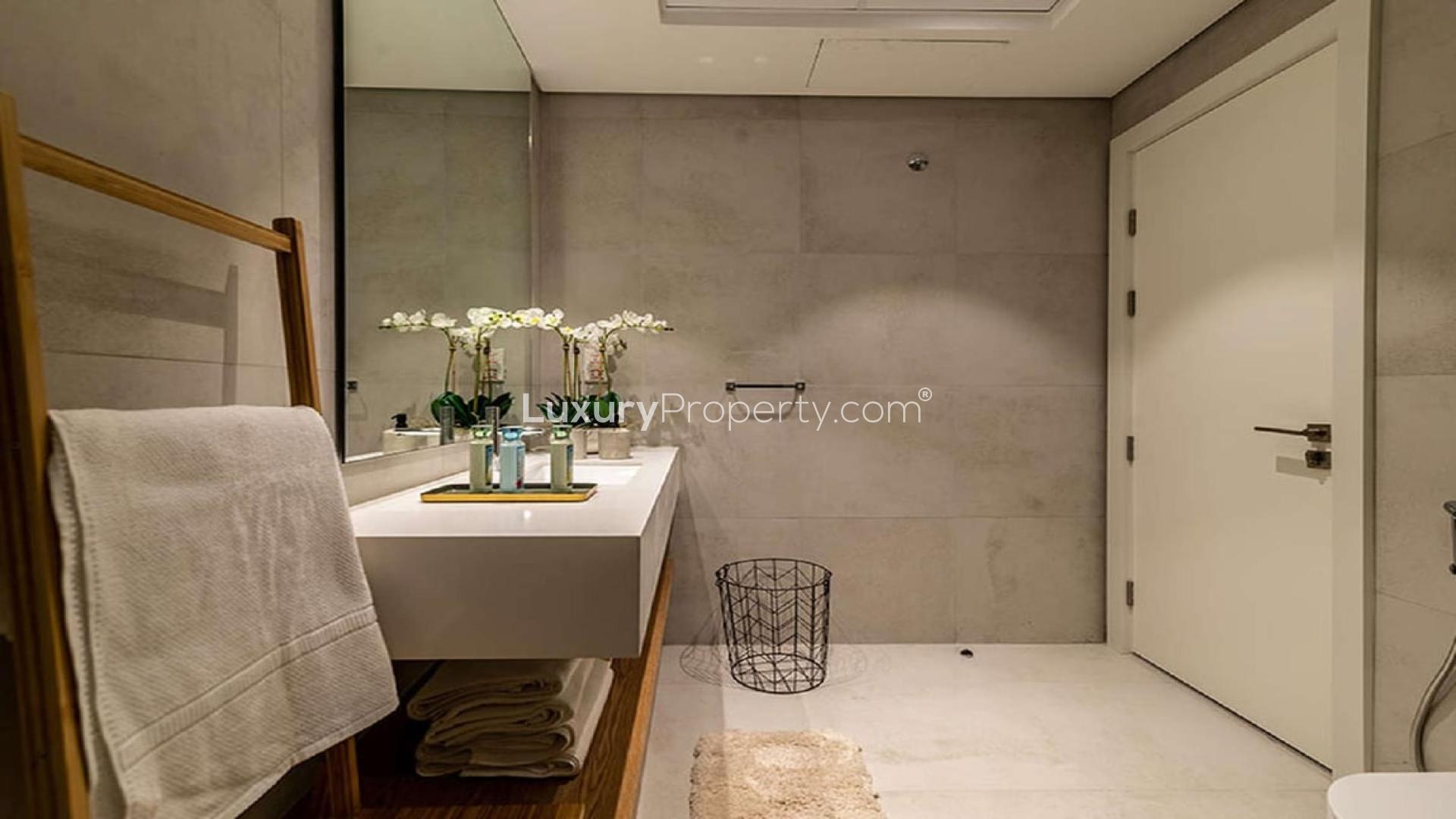 Modern living room in 3-bedroom apartment, Olivara Residences, Dubai Studio City, open-plan design