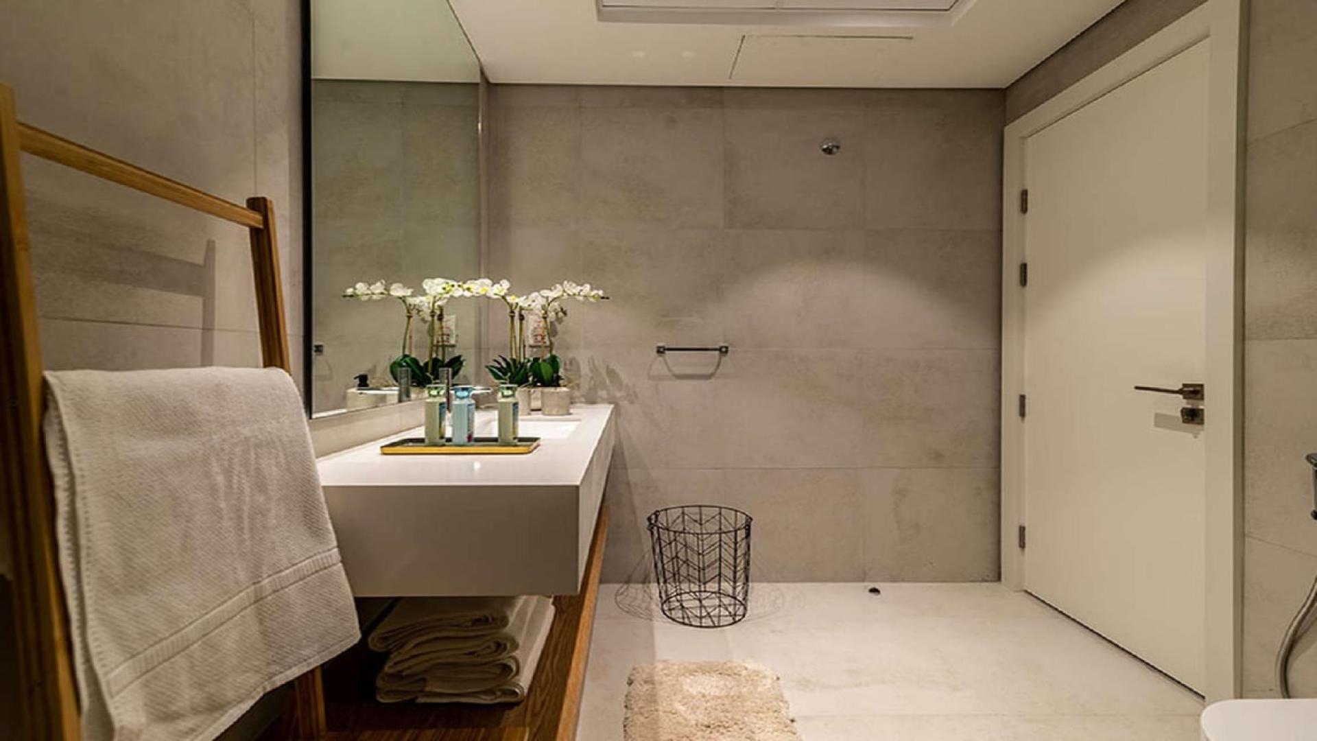 Modern living room in 3-bedroom apartment, Olivara Residences, Dubai Studio City, open-plan design