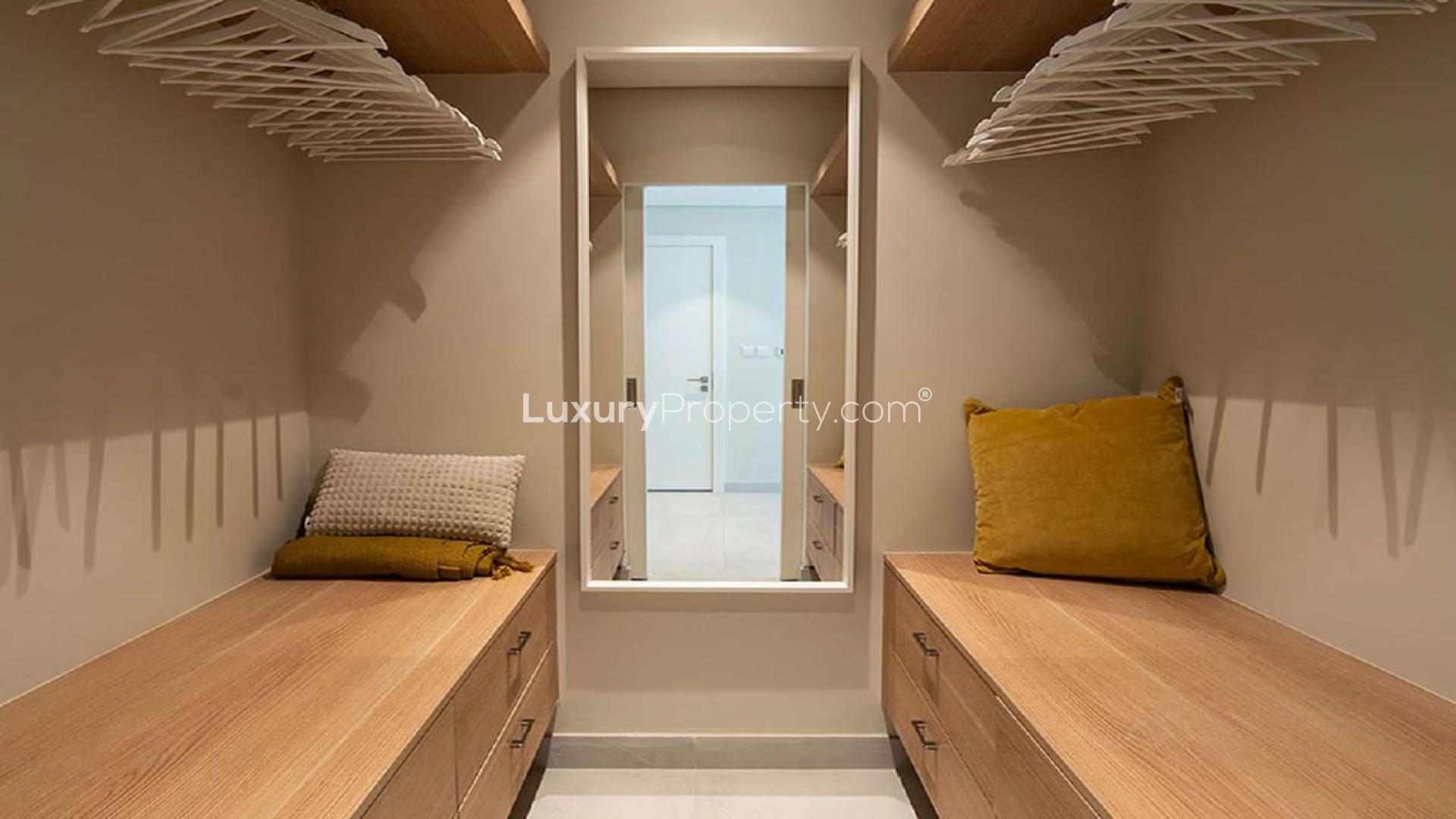 Exterior view of Olivara Residences apartment building in Dubai Studio City for rent