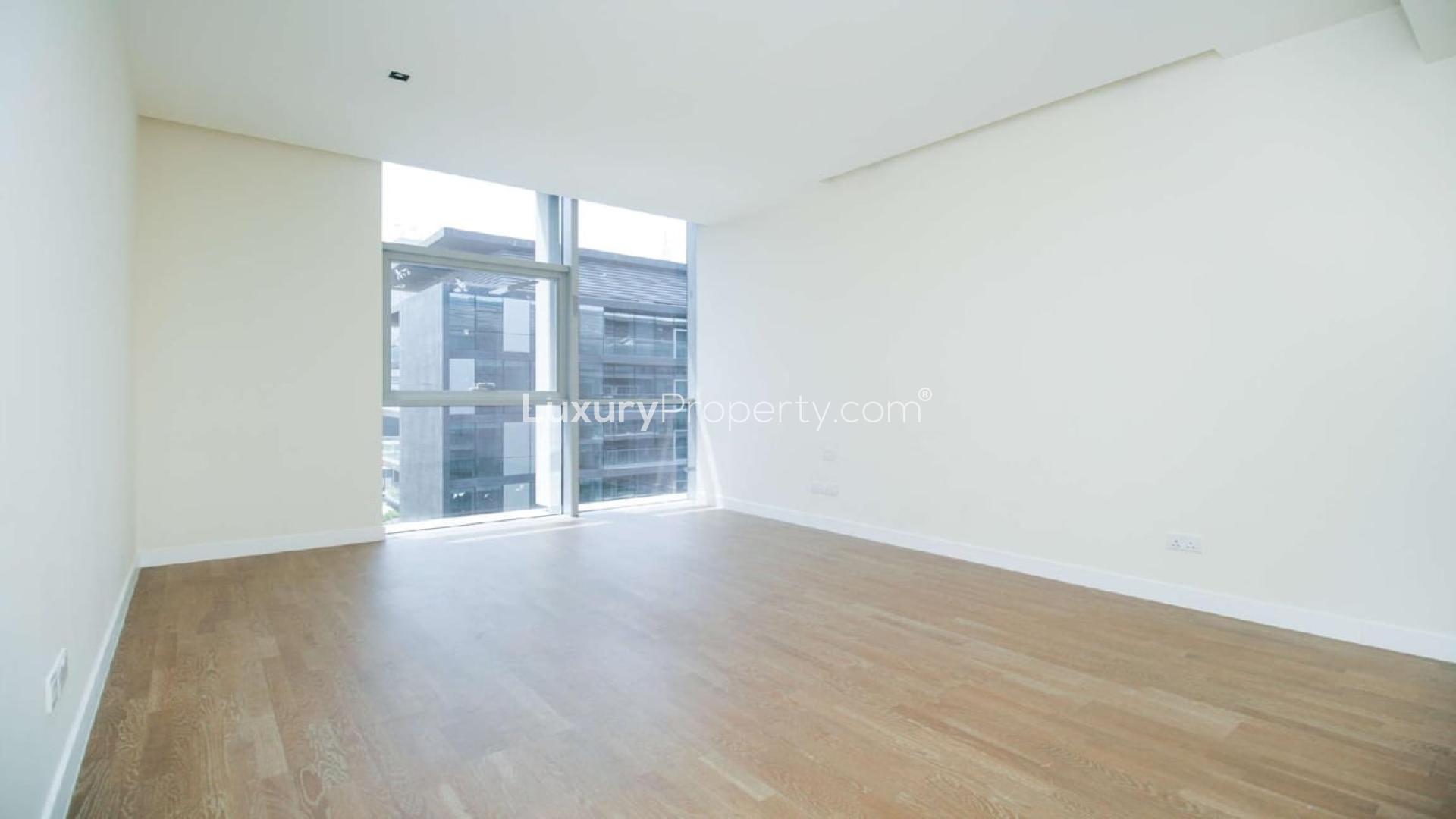 Spacious living area with modern kitchen in City Walk, Dubai apartment for rent