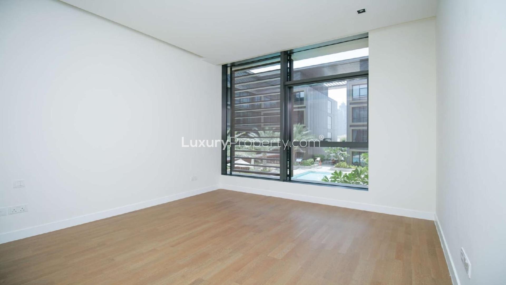 Spacious living room with pool view in three-bedroom City Walk apartment, Jumeirah for rent