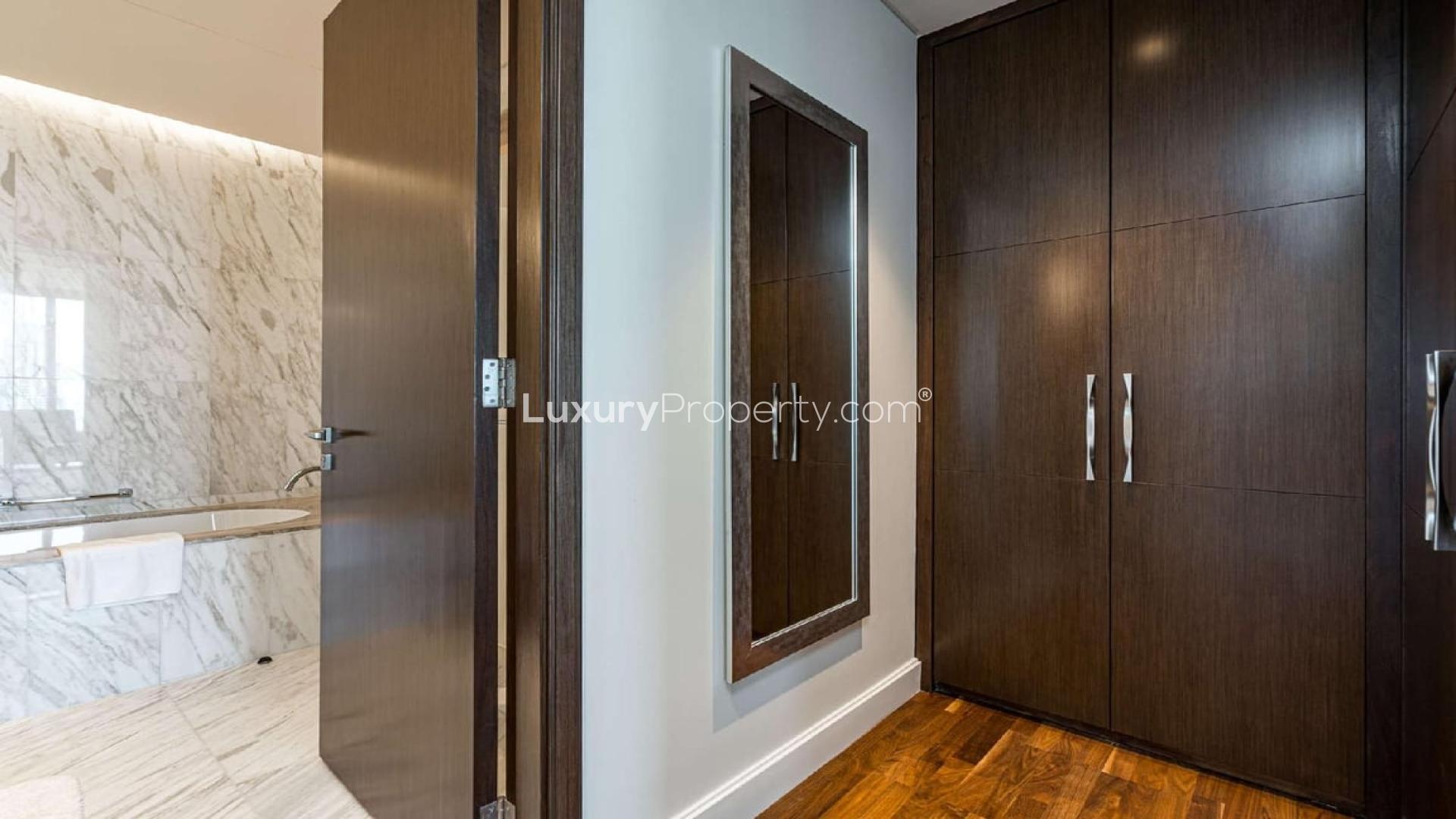 Luxuriously furnished living area in two-bed serviced apartment, Downtown Dubai, for sale