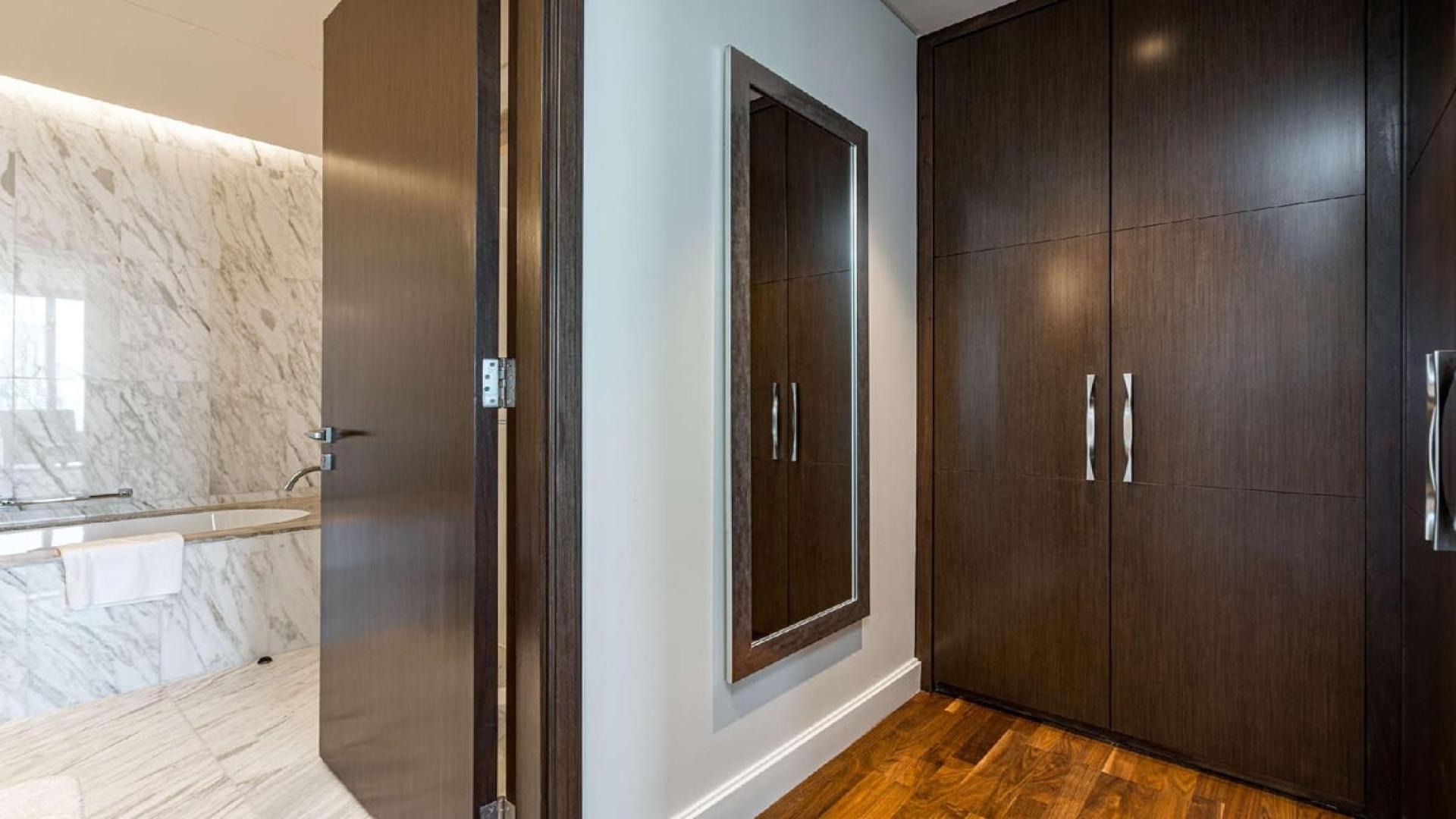 Luxuriously furnished living area in two-bed serviced apartment, Downtown Dubai, for sale