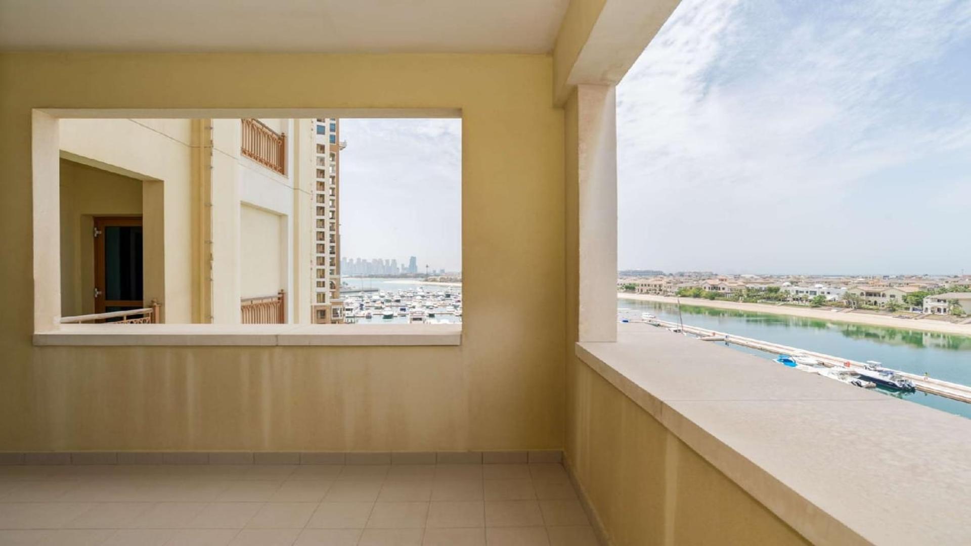 Marina view from 3-bedroom apartment in Marina Residences, Palm Jumeirah, with boats and skyline