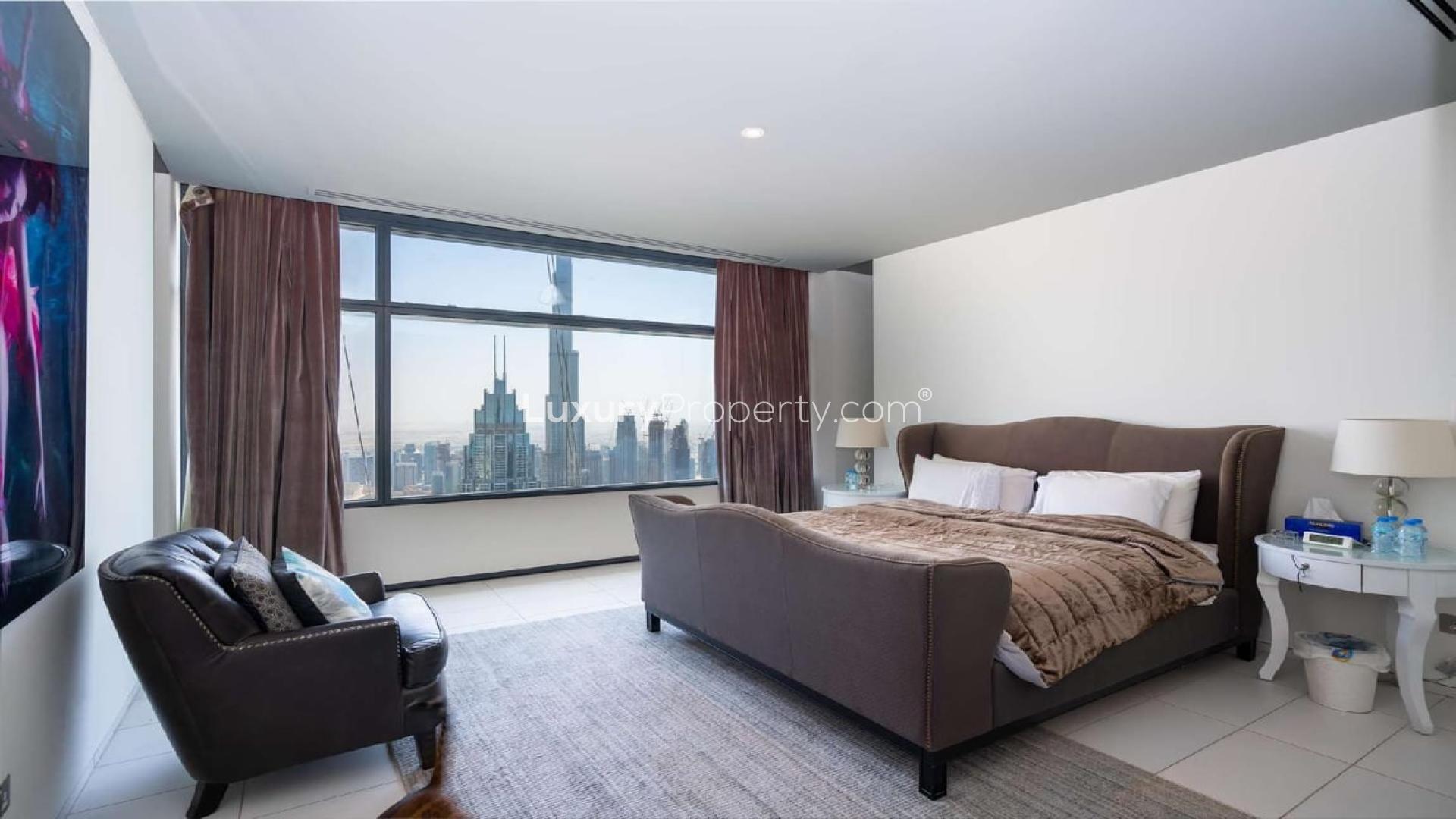 Luxurious living room in three-bedroom DIFC Index Tower apartment with stunning city views