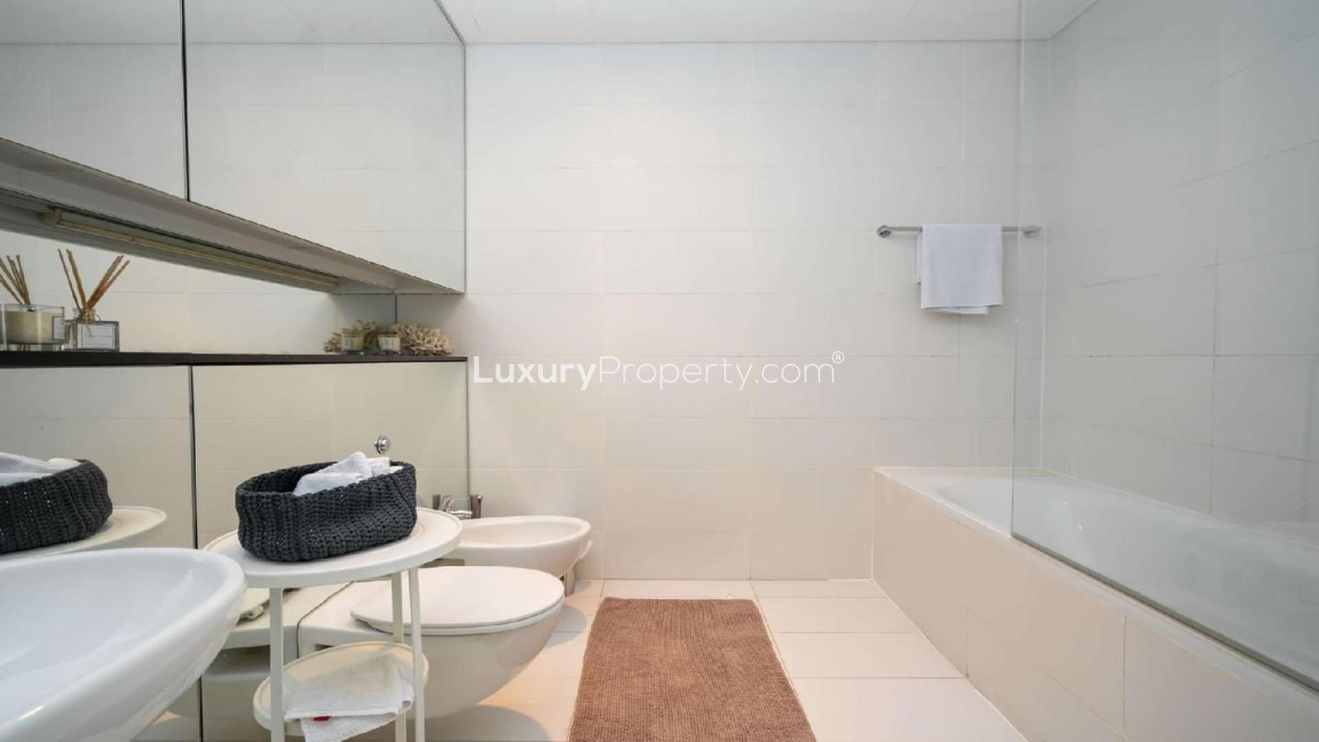 Luxurious living room with city view in DIFC Index Tower three-bedroom apartment